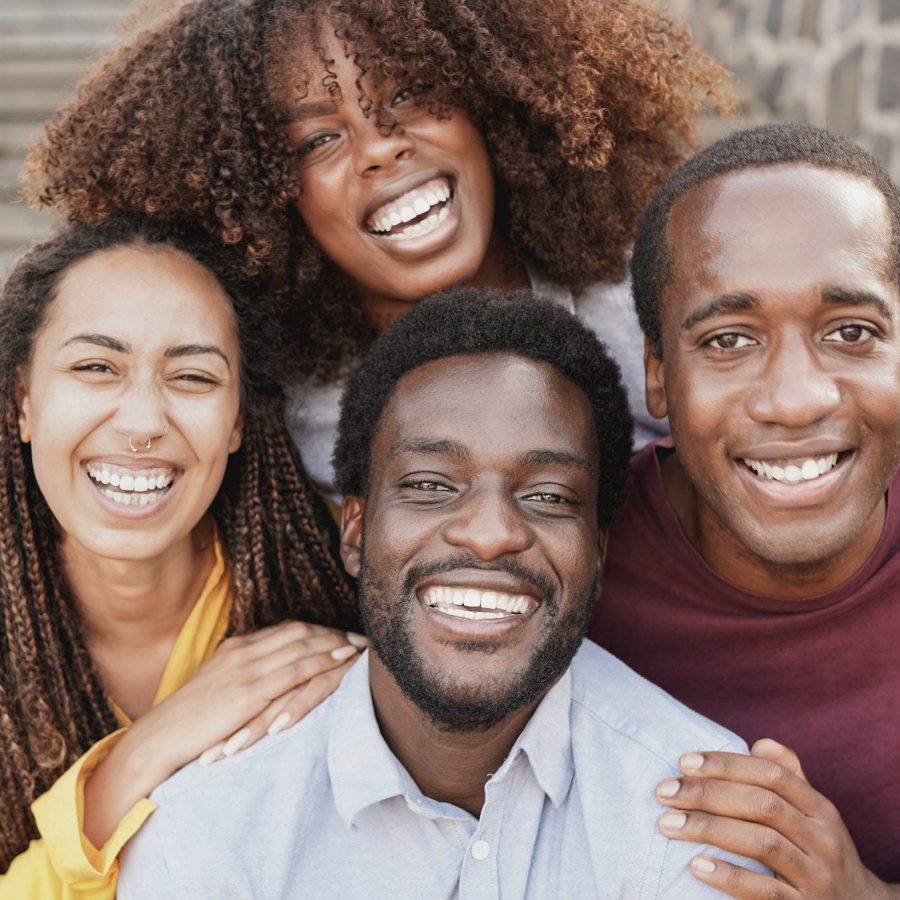 Goup of young african people smiling on camera